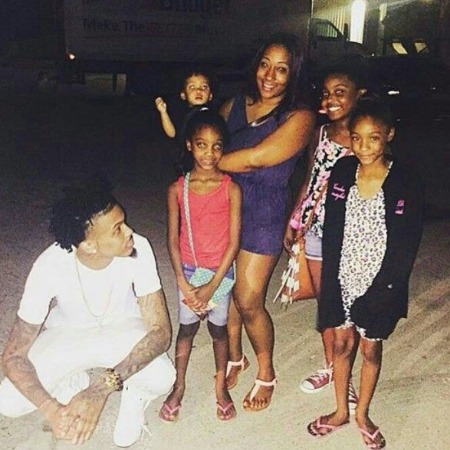 August Alsina with his nieces .